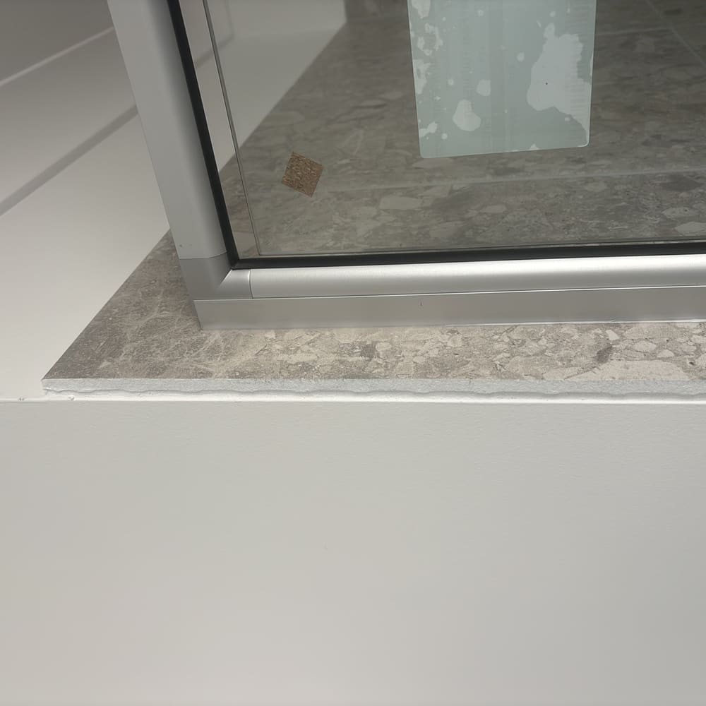 Caulking to wall/ floor/skirting joints, recorded during a fixing inspection in Beveridge