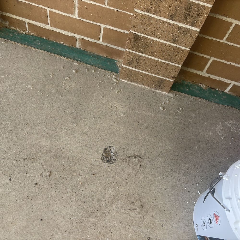 The inspector noted that concrete stains need cleaning before the slab is ready for use, Beveridge, Whittlesea
